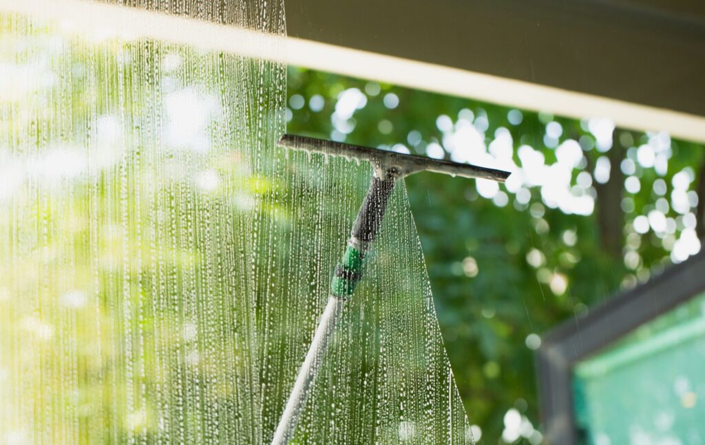 Cleaning windows for a summer property viewing